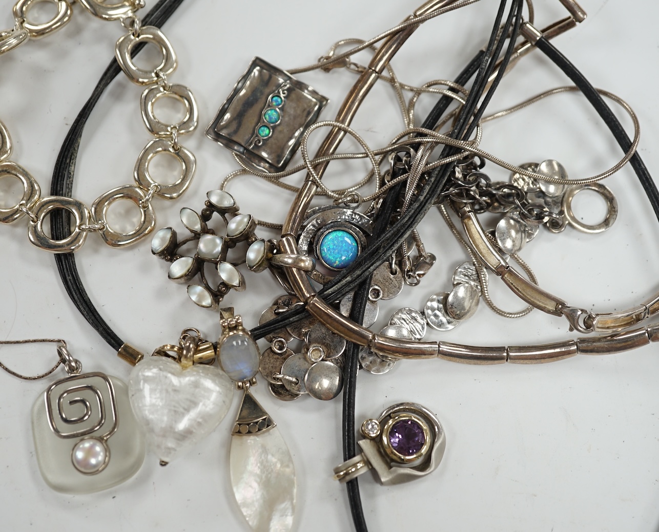 A small group of assorted modern 925 and white metal jewellery including necklaces, bracelet etc. Condition - fair